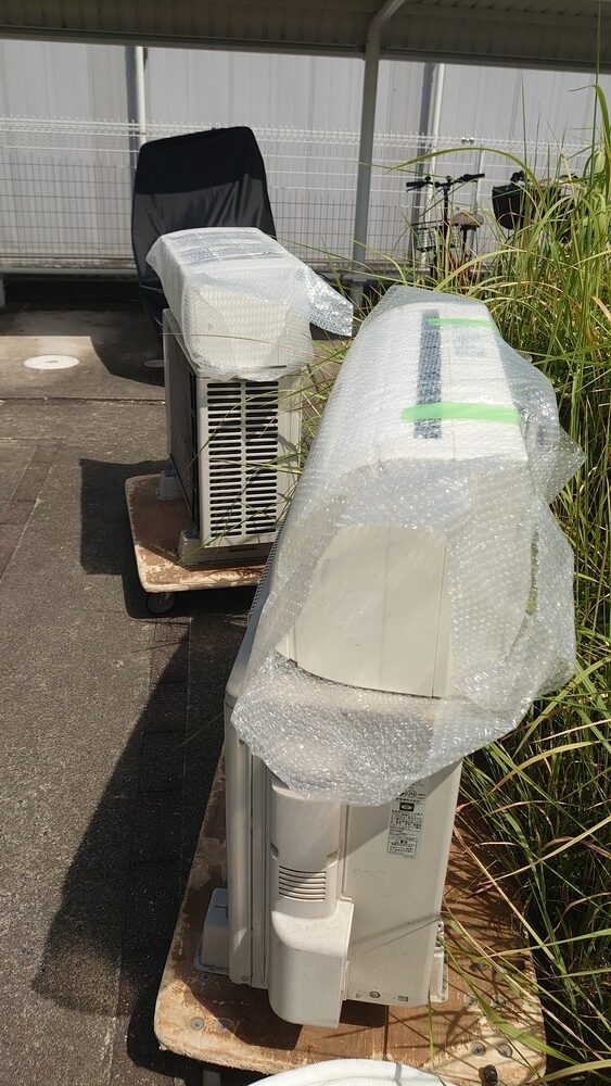 仮住まいのマンションへ台車で丁寧に運搬